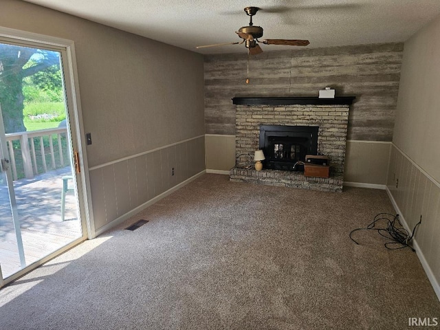 5924 S 300 E 57 Rd, Churubusco, IN 46723 - unfurnished living room featuring ceiling fan, carpet floors, and a wainscoted wall
