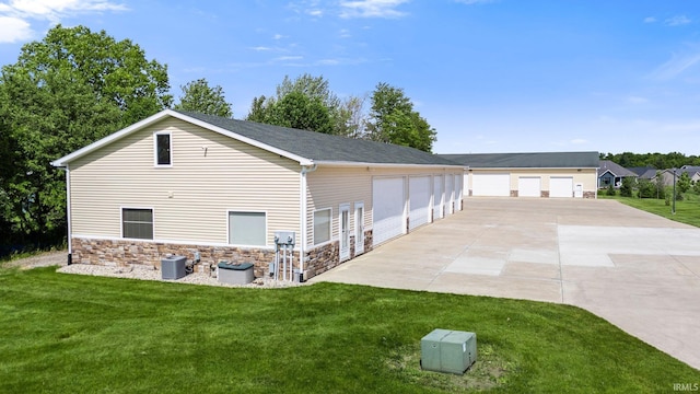 17818 Amstutz Rd, Leo, IN 46765 - rear view of property with stone siding and a lawn