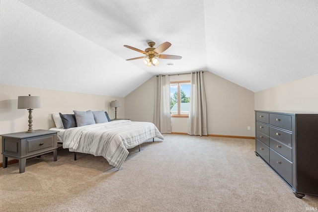 17818 Amstutz Rd, Leo, IN 46765 - bedroom featuring light carpet, vaulted ceiling, a ceiling fan, and a textured ceiling