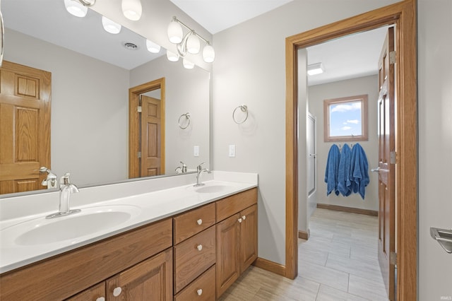 17818 Amstutz Rd, Leo, IN 46765 - bathroom with double vanity and baseboards