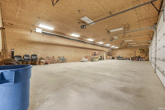 17818 Amstutz Rd, Leo, IN 46765 - garage featuring a garage door opener