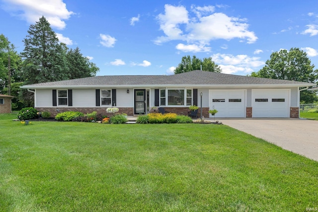2131 E 430 Rd S, Lafayette, IN 47909 - ranch-style home featuring brick siding, an attached garage, concrete driveway, and a front yard