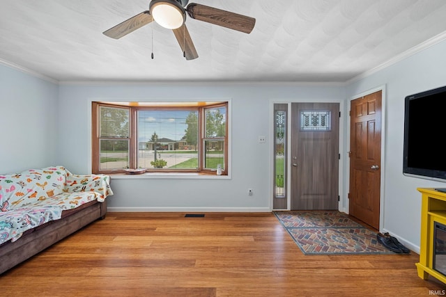 2131 E 430 Rd S, Lafayette, IN 47909 - entrance foyer featuring light wood-type flooring, crown molding, and ceiling fan