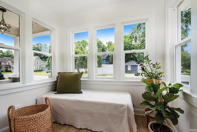 507 W Marion St, South Bend, IN 46601 - bedroom featuring multiple windows and wood finished floors