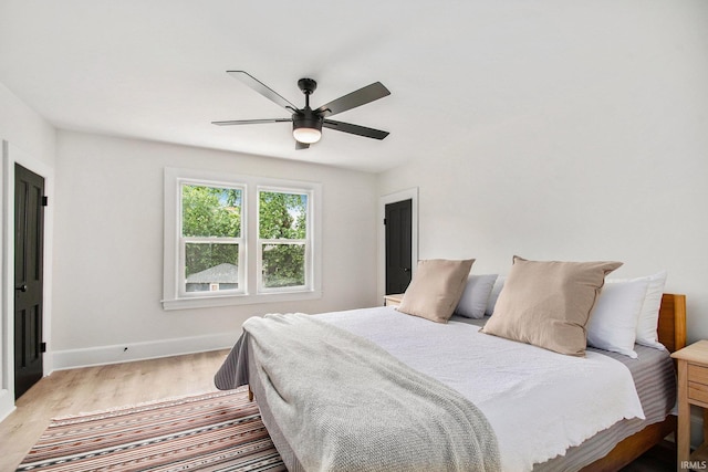 507 W Marion St, South Bend, IN 46601 - bedroom featuring light wood-style flooring and a ceiling fan