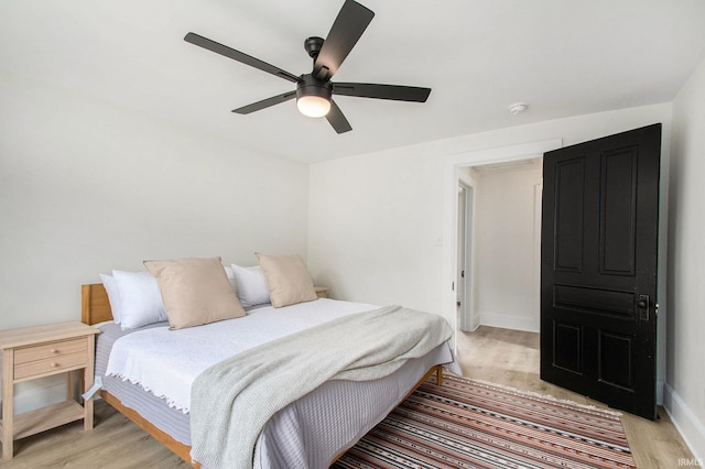 507 W Marion St, South Bend, IN 46601 - bedroom with light wood-type flooring and a ceiling fan