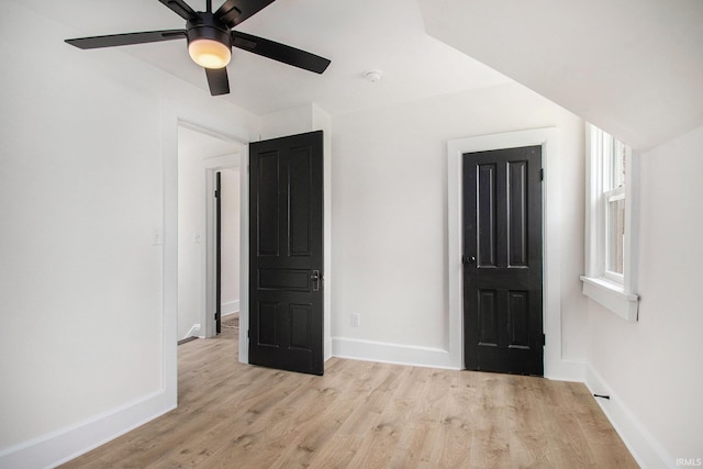 507 W Marion St, South Bend, IN 46601 - unfurnished bedroom with light wood-style flooring and a ceiling fan