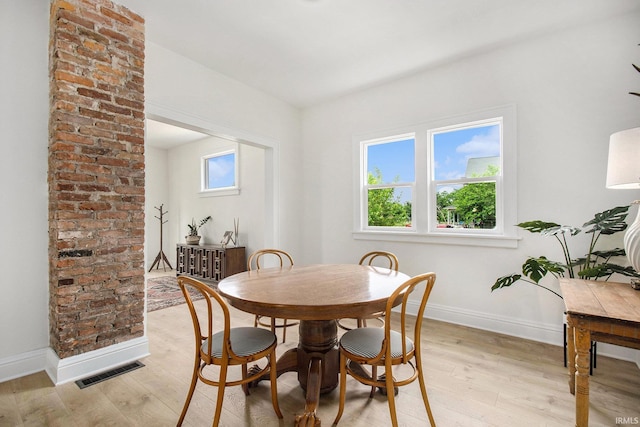 507 W Marion St, South Bend, IN 46601 - dining space with baseboards and light wood-style flooring