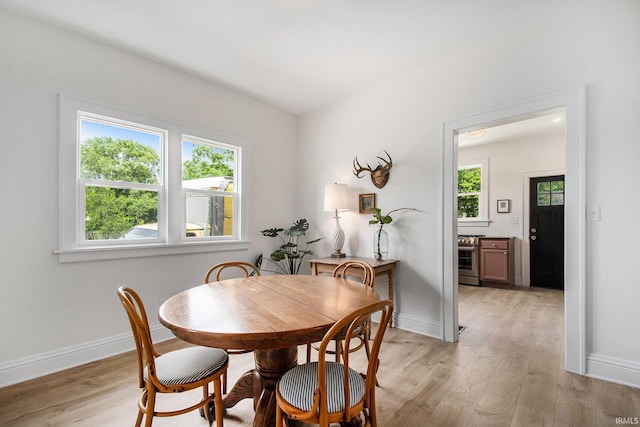507 W Marion St, South Bend, IN 46601 - dining space with light wood-style floors