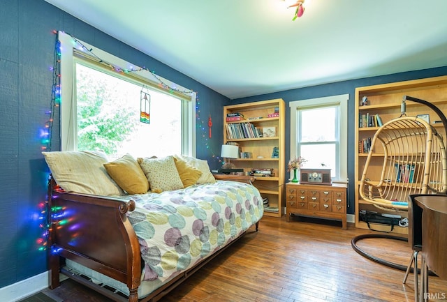 504 E Dixie St, Bloomington, IN 47401 - bedroom with multiple windows and hardwood / wood-style flooring