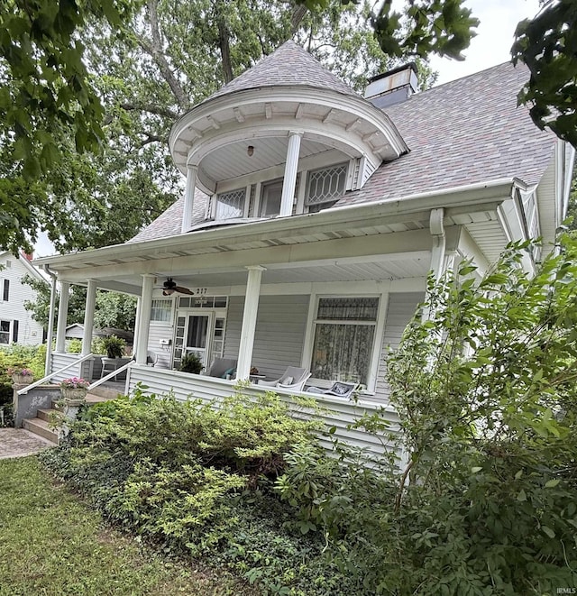 217 S 9th St, Vincennes, IN 47591 - victorian house with a porch, a ceiling fan, and a chimney