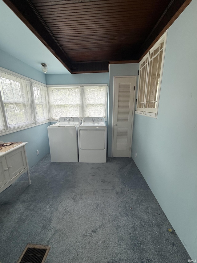 217 S 9th St, Vincennes, IN 47591 - laundry room with washing machine and dryer, carpet floors, and wooden ceiling