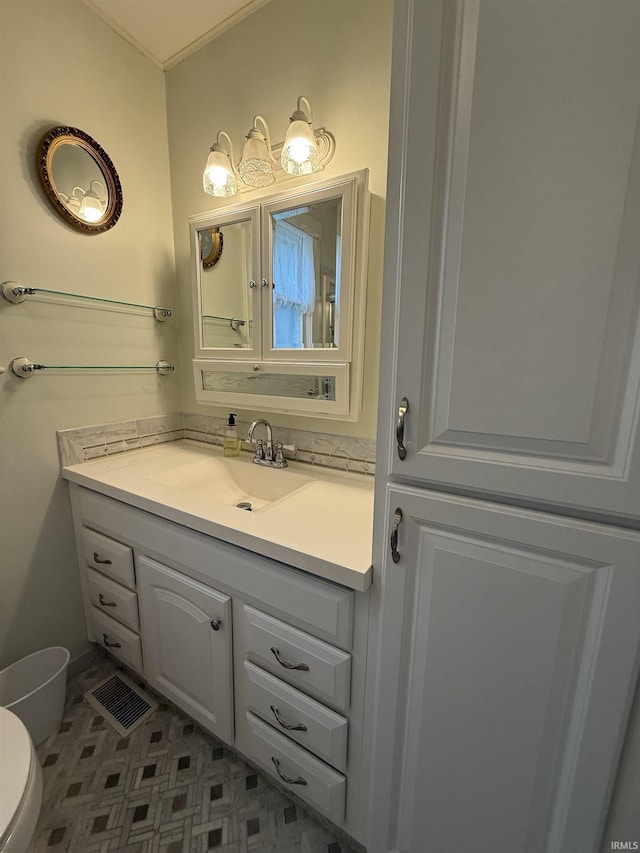 217 S 9th St, Vincennes, IN 47591 - bathroom featuring vanity and toilet