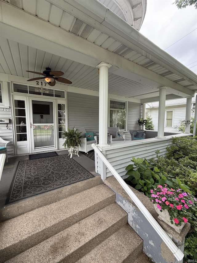 217 S 9th St, Vincennes, IN 47591 - entrance to property with ceiling fan, a porch, and an outdoor living space