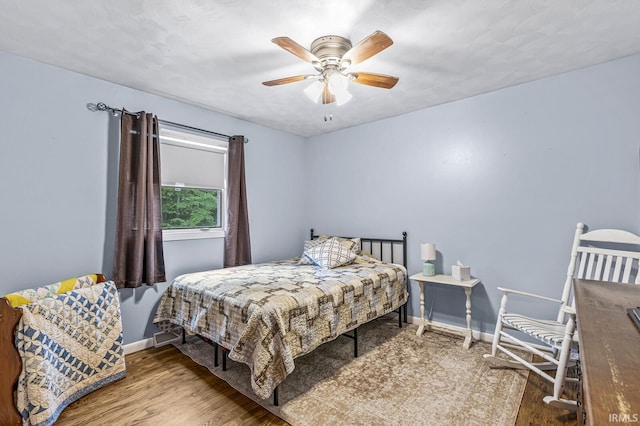 60175 Emerald Dr, South Bend, IN 46614 - bedroom featuring wood finished floors and a ceiling fan