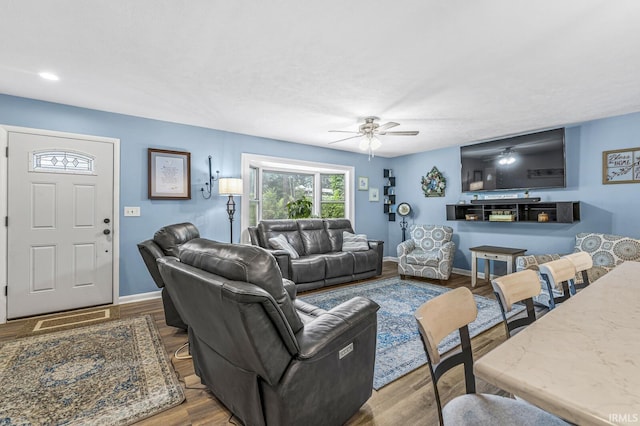 60175 Emerald Dr, South Bend, IN 46614 - living area featuring ceiling fan and wood finished floors