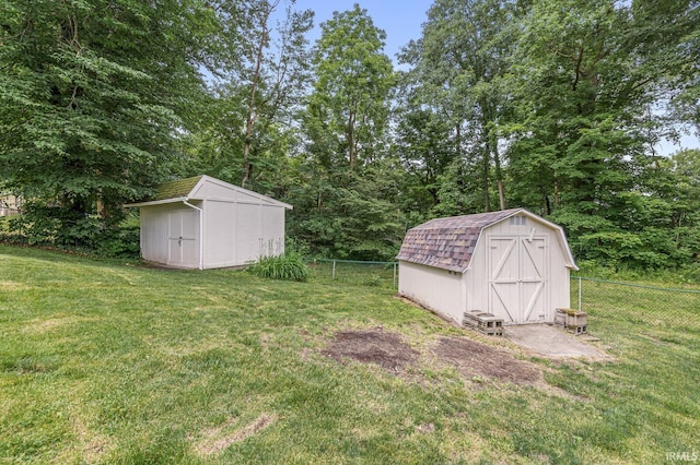 60175 Emerald Dr, South Bend, IN 46614 - fenced backyard featuring a storage shed