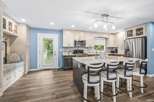 60175 Emerald Dr, South Bend, IN 46614 - kitchen featuring stainless steel appliances, tasteful backsplash, healthy amount of natural light, and recessed lighting