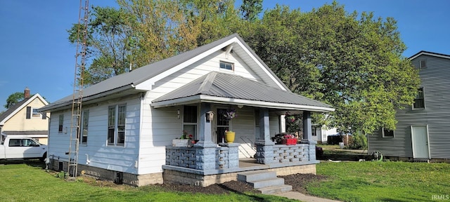 601 N State Road 57, Washington, IN 47501 - view of front of property with a porch, a front lawn, and a metal roof