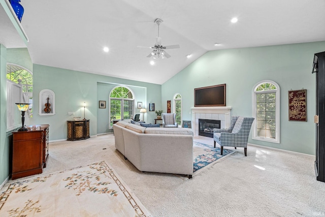 2166 Willow Creek Dr, Mishawaka, IN 46545 - living room with carpet flooring, a ceiling fan, a fireplace, recessed lighting, and high vaulted ceiling