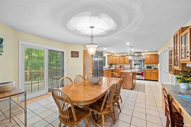 2166 Willow Creek Dr, Mishawaka, IN 46545 - dining area featuring light tile patterned floors, a textured ceiling, and recessed lighting