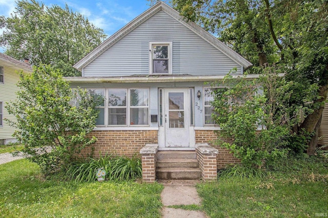 227 E Marion St, Mishawaka, IN 46545 - bungalow-style home with entry steps and brick siding