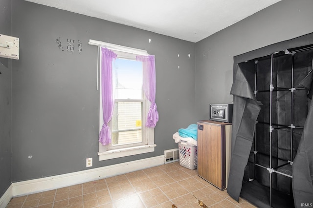 227 E Marion St, Mishawaka, IN 46545 - bedroom with baseboards