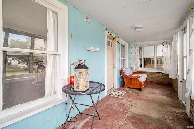 227 E Marion St, Mishawaka, IN 46545 - sunroom / solarium with plenty of natural light and concrete flooring