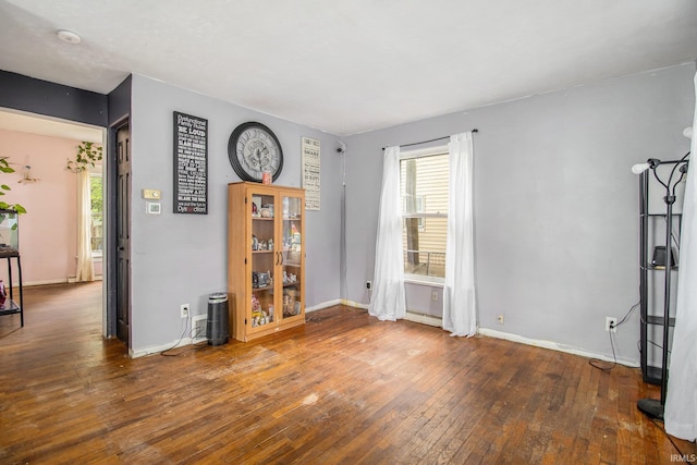 227 E Marion St, Mishawaka, IN 46545 - unfurnished room with hardwood / wood-style floors, healthy amount of natural light, and a smoke detector