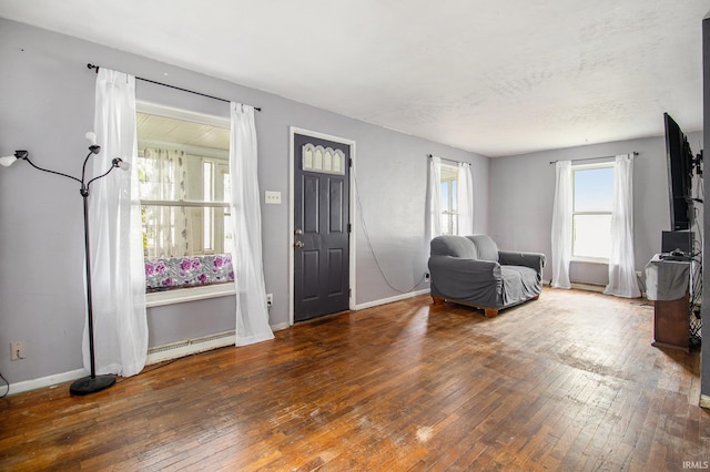 227 E Marion St, Mishawaka, IN 46545 - entryway with hardwood / wood-style flooring and a baseboard radiator
