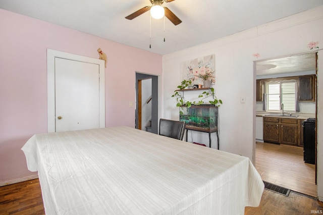 227 E Marion St, Mishawaka, IN 46545 - bedroom featuring a sink and light wood-style floors