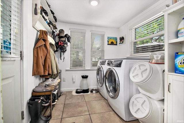 909 Independence St, Elkhart, IN 46514 - washroom featuring washing machine and clothes dryer and light tile patterned floors