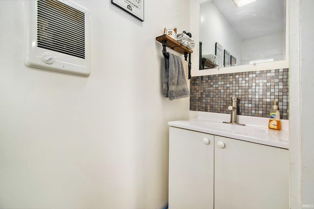 909 Independence St, Elkhart, IN 46514 - bathroom with vanity and backsplash