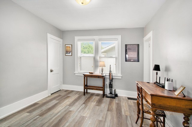909 Independence St, Elkhart, IN 46514 - office area with wood finished floors and baseboards
