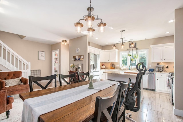 820 N Niles Ave Unit C, South Bend, IN 46617 - dining room with a chandelier, recessed lighting, and stairway