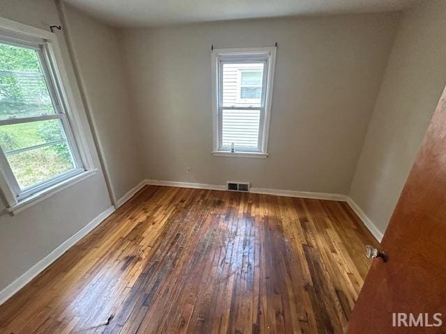 414 Klinger Ave, Plymouth, IN 46563 - unfurnished room with hardwood / wood-style flooring and plenty of natural light