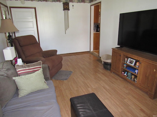 126 W W Blvd, Kokomo, IN 46902 - living room with light wood finished floors and baseboards