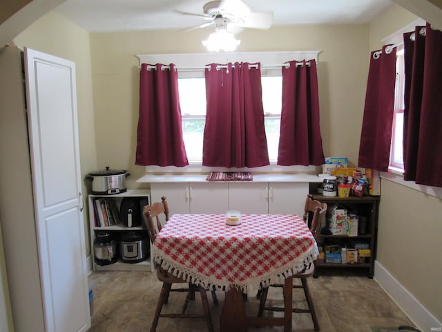 126 W W Blvd, Kokomo, IN 46902 - dining area featuring ceiling fan and arched walkways