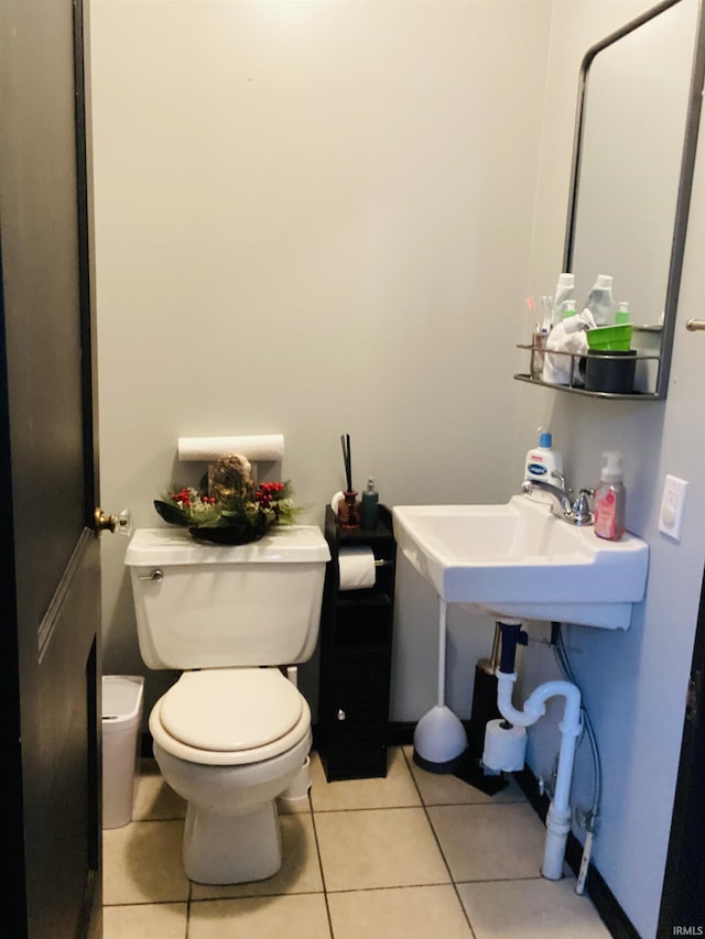 706 11th St, Tell City, IN 47586 - half bath with toilet and tile patterned flooring
