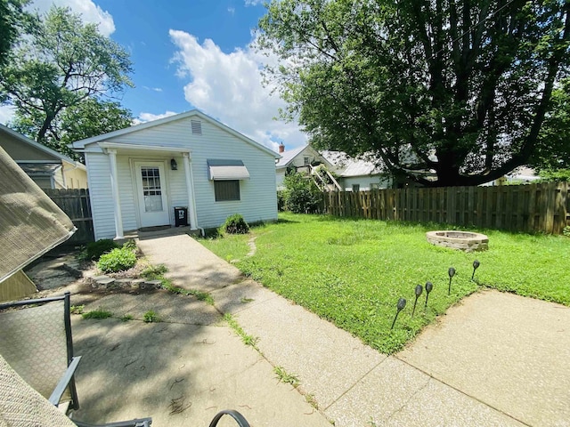 706 11th St, Tell City, IN 47586 - view of front facade with an outdoor fire pit