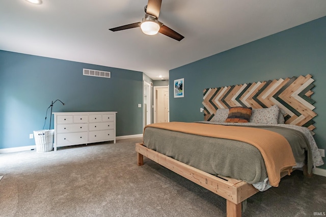 2200 E Boonville New Harmony Rd, Evansville, IN 47725 - carpeted bedroom with baseboards and ceiling fan