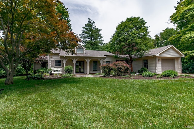 2200 E Boonville New Harmony Rd, Evansville, IN 47725 - view of front of house featuring an attached garage, a porch, a front lawn, and a shingled roof
