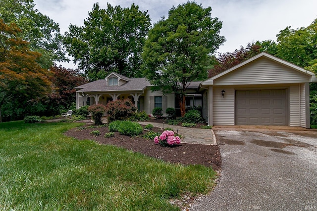 2200 E Boonville New Harmony Rd, Evansville, IN 47725 - view of front of property featuring driveway, an attached garage, and a front yard