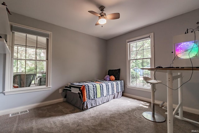 2200 E Boonville New Harmony Rd, Evansville, IN 47725 - bedroom with carpet floors and a ceiling fan