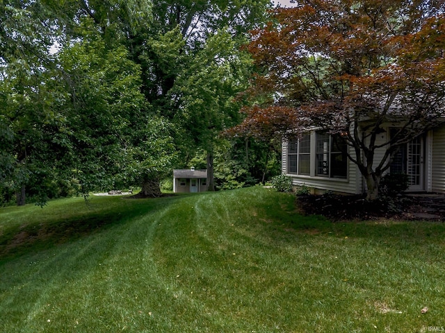 2200 E Boonville New Harmony Rd, Evansville, IN 47725 - view of green lawn featuring an outbuilding
