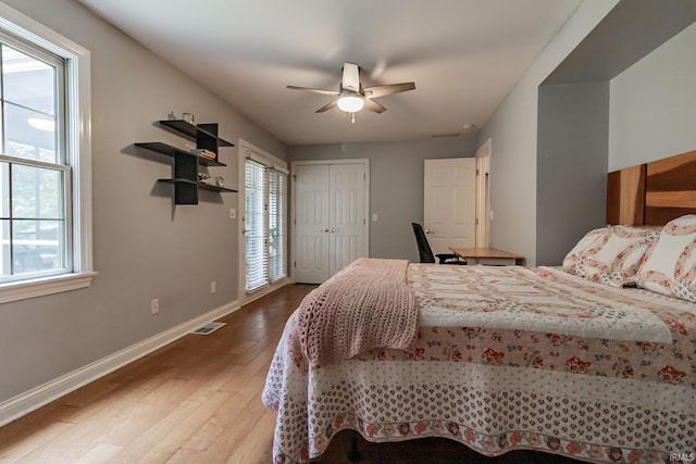 2200 E Boonville New Harmony Rd, Evansville, IN 47725 - bedroom featuring wood finished floors, ceiling fan, and a closet