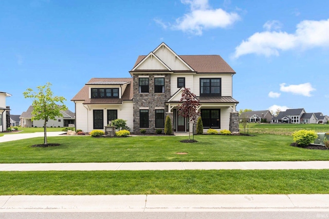 18015 Tullymore Ln, Leo, IN 46765 - craftsman house with stone siding, a front lawn, board and batten siding, and a residential view