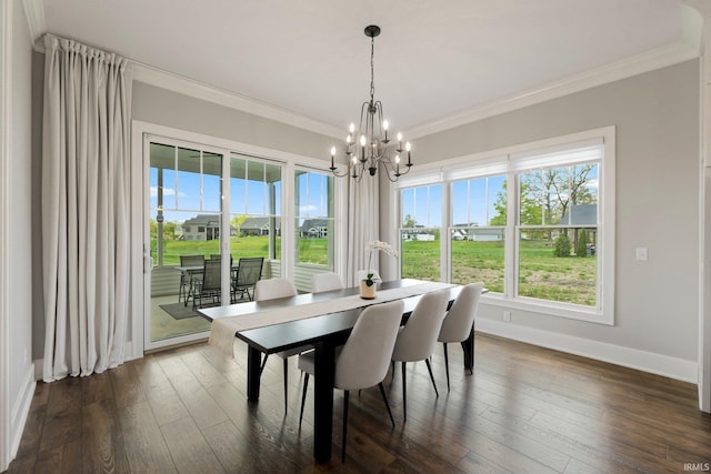 18015 Tullymore Ln, Leo, IN 46765 - dining room with crown molding, healthy amount of natural light, a chandelier, and dark wood finished floors