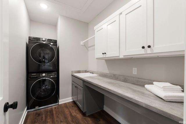 18015 Tullymore Ln, Leo, IN 46765 - laundry room featuring cabinet space, stacked washer and clothes dryer, dark wood-style flooring, and recessed lighting