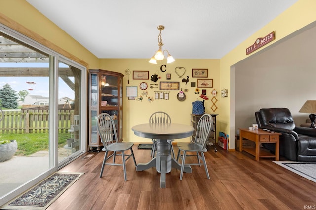 12426 Sonoma, Fort Wayne, IN 46818 - dining space with healthy amount of natural light, wood finished floors, and a chandelier